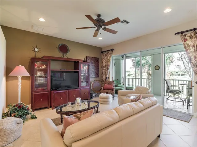 Tiled living room with ceiling fan