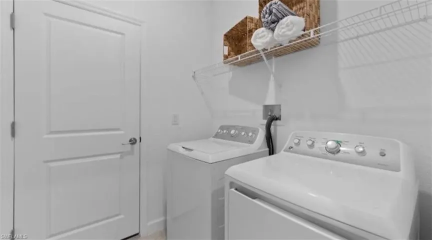 Laundry room with washer and dryer