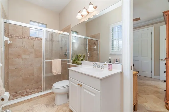 Attached bathroom for second bedroom.  Entrance from lanai as well.