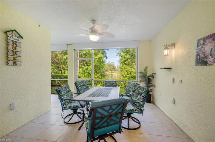 Large L shaped screened patio with lake views
