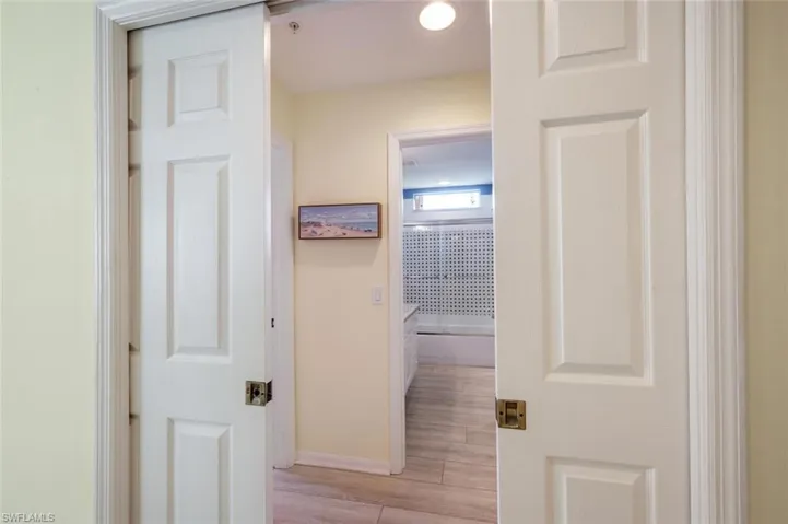 Double pocket doors for private guest suite & laundry