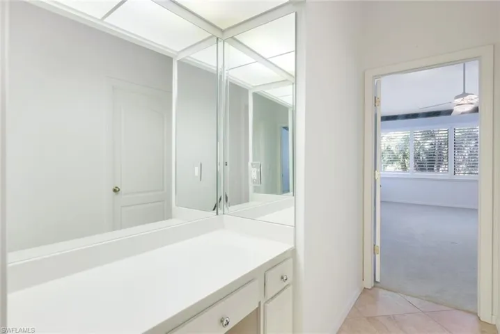 Primary Bedroom- Separate Vanity or Desk Area Located in Hall Area inside the Suite