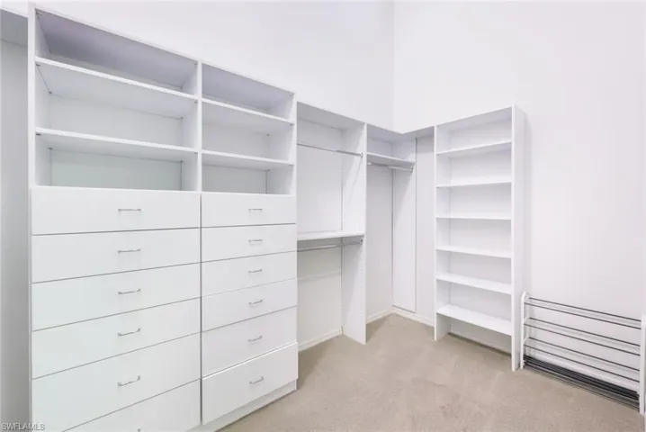 Primary Closet- Partial View- Room for Everything and More!