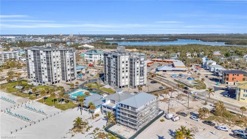 Aerial view featuring a water view virtually enhanced image