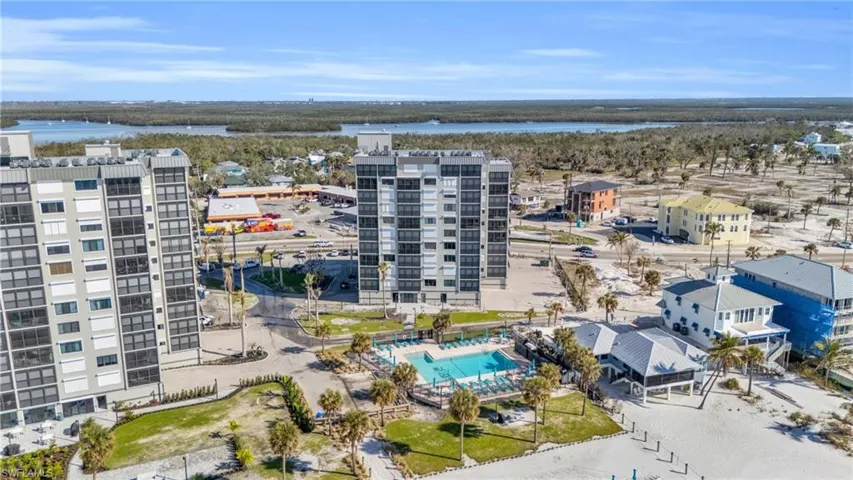 Birds eye view of property with a water view virtually enhanced image