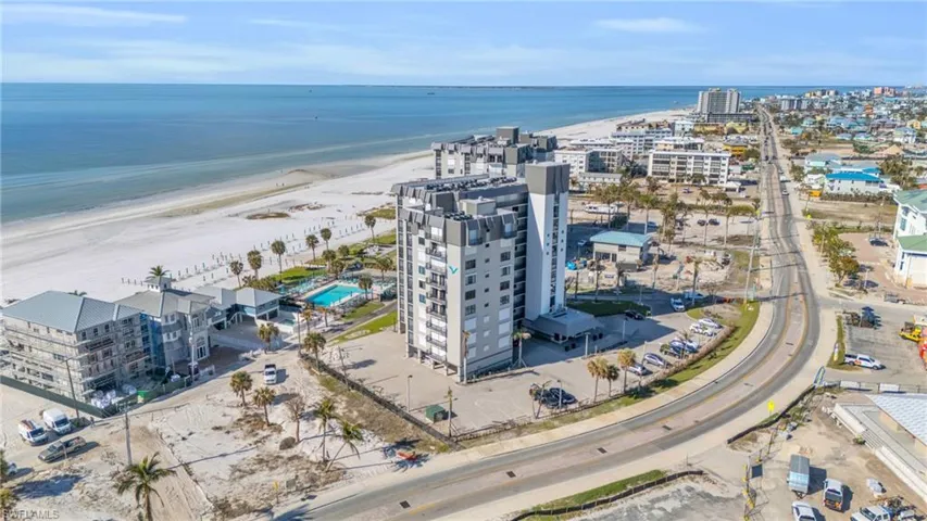 Bird's eye view with a water view and a view of the beach virtually enhanced image, virtually enhanced image