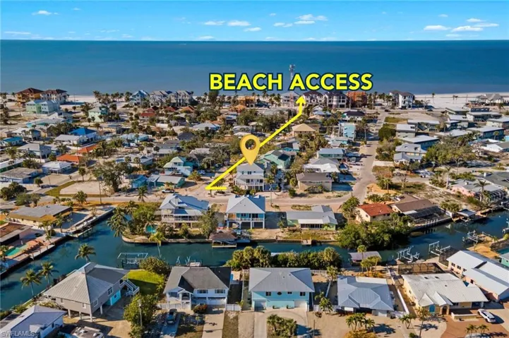 Beach Access #1 - Drone / aerial view featuring a water view and a residential view  - Virtually Edited Image