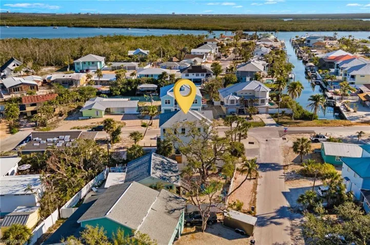 Bird's eye view with a residential view and a water view  - Virtually Edited Image