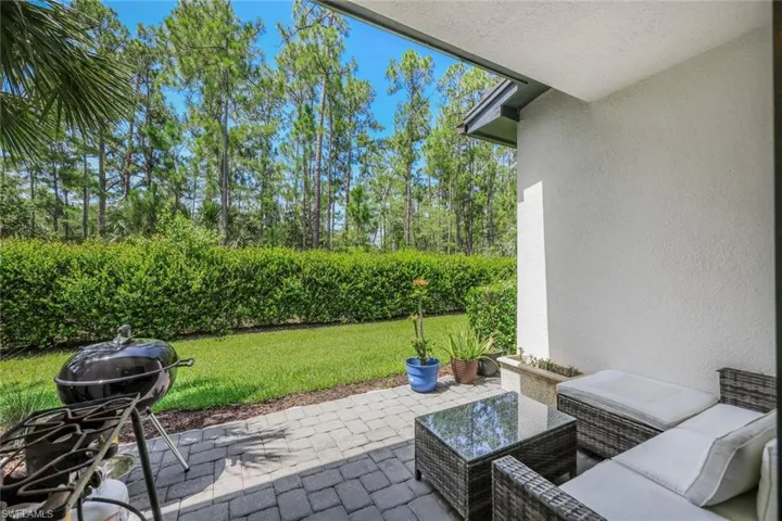Covered Patio - Faces South and Overlooks the Preserve / Landscaped Area