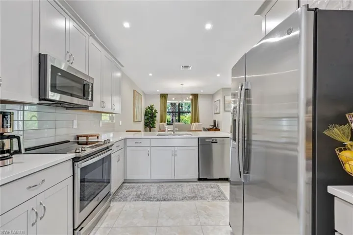 Kitchen - Featuring Stainless Steel Appliances & Quartz Countertops