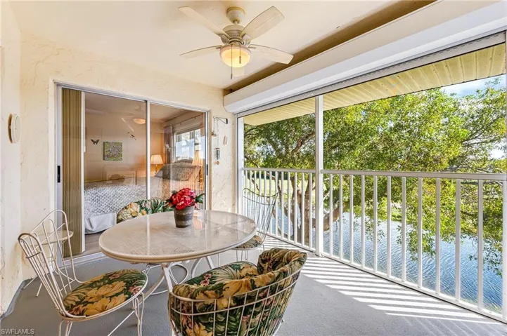 SCREENED LANAI WITH WATER VIEWS AND ELECTRIC SHUTTER