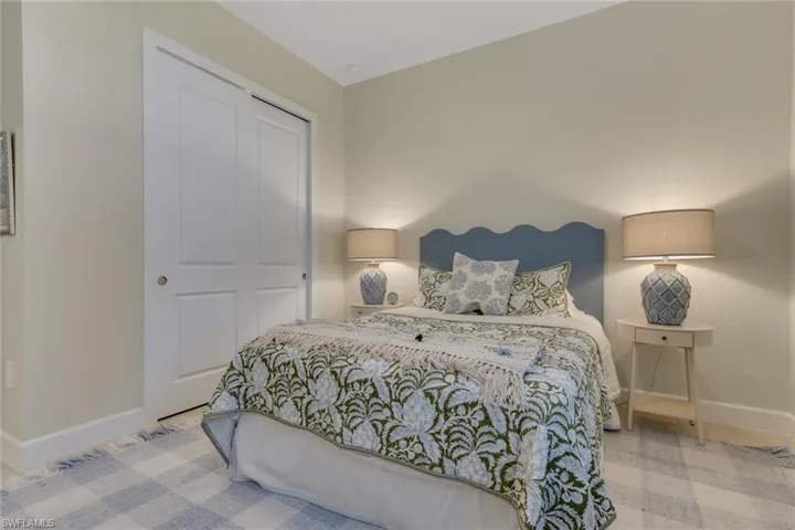 Bedroom with baseboards and a closet