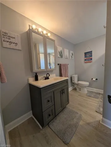 Bathroom featuring vanity and  LVP finished floors