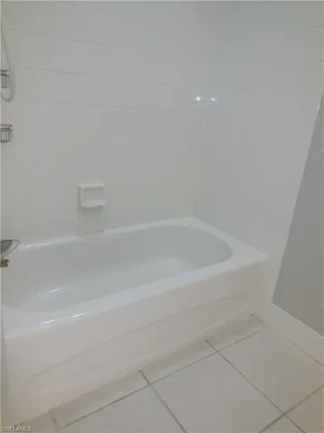 Bathroom featuring tile patterned floors