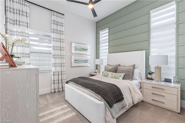 Bed 3 with custom wall details and ceiling fan