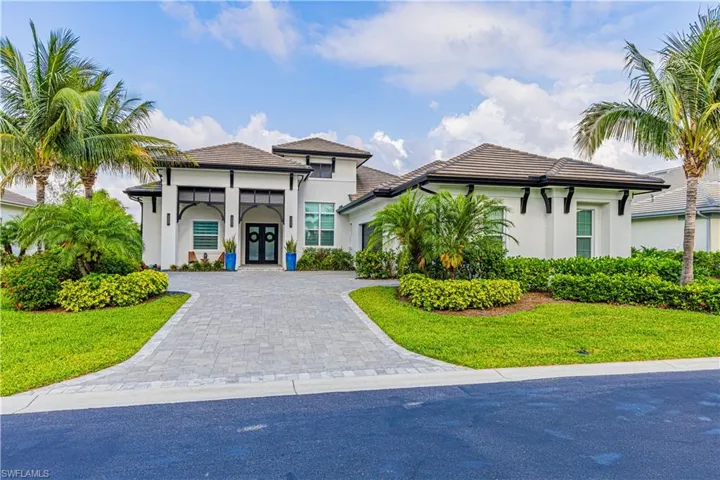 Extra wide yard and large paved driveway