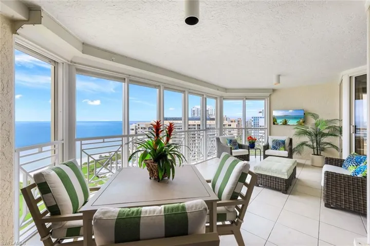 Spacious Gulf Front Lanai accessible from the living room, den, & primary bedroom