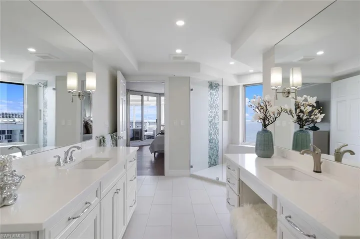 Primary Bathroom with large step in shower that has stunning Gulf/Beach views