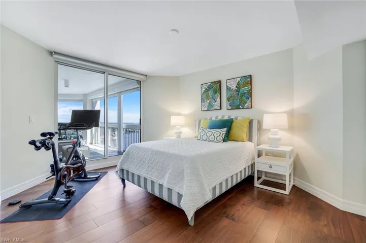 Guest bedroom with access to the large Bay & Beach view lanai
