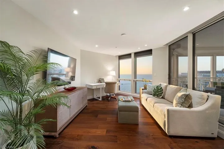 As the sun sets after another perfect day in Naples, the soft light from every room of this special home is lovely