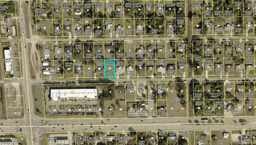 Aerial overview of property's location featuring property parcel outlined