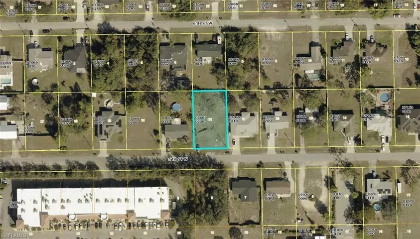 Aerial overview of property's location with property parcel outlined