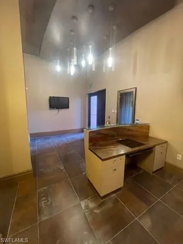 Lobby featuring decorative light & Desk