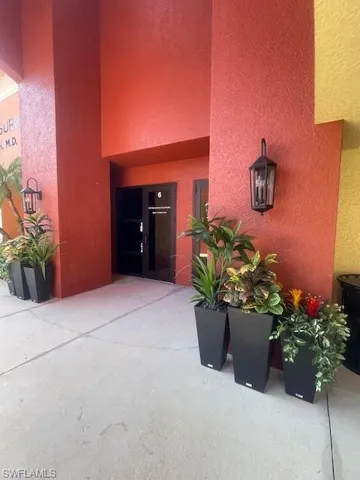 Entrance to property with a patio area