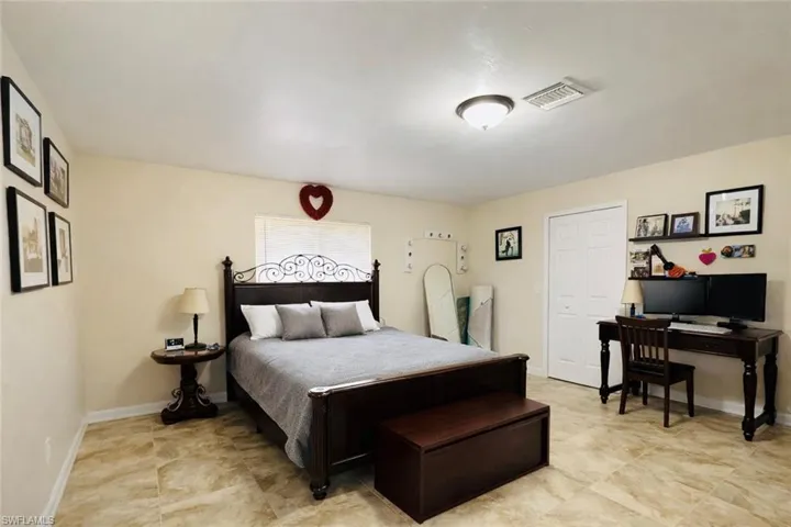 Bedroom with baseboards