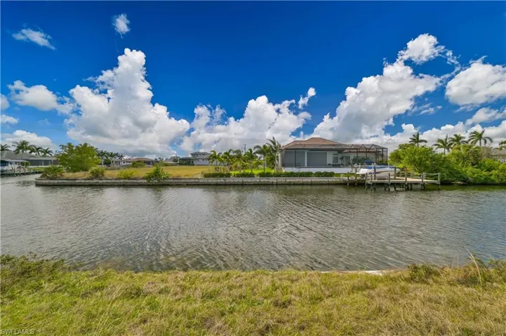 Water view featuring a dock and boat lift