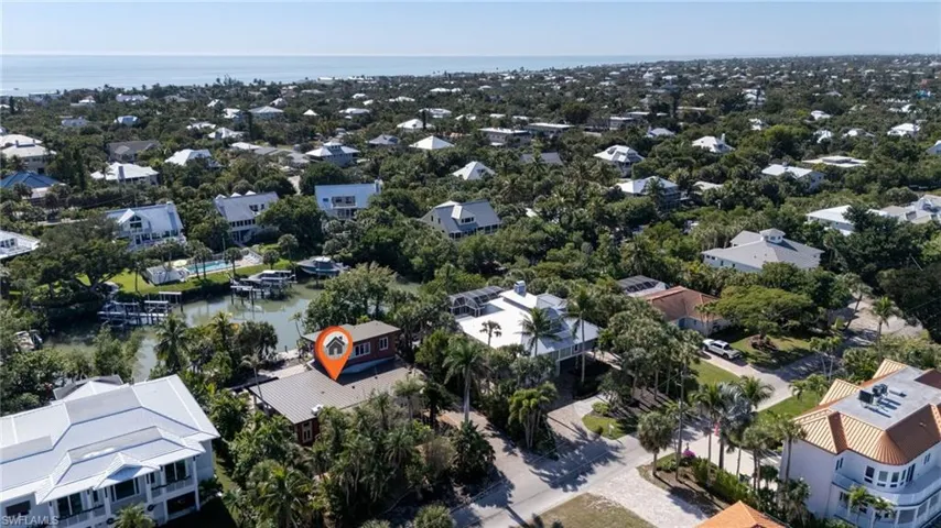 View of property location featuring nearby suburban area and a large body of water