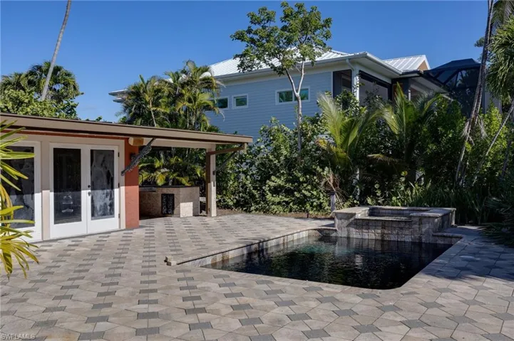 View of property location featuring nearby suburban area and a large body of water