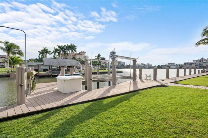 Boat dock with 10,000lb lift, electricity & water