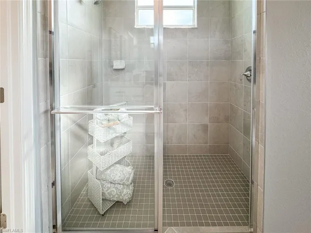 Bathroom with a stall shower