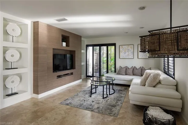 Living room featuring built in features