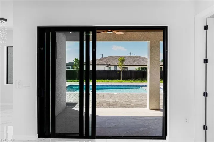 Doorway featuring a healthy amount of sunlight