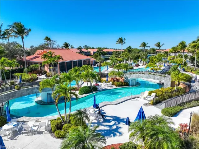 Community pool with a patio area