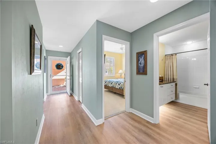 Front entrance featuring light wood floors and recessed lighting light neutral colors