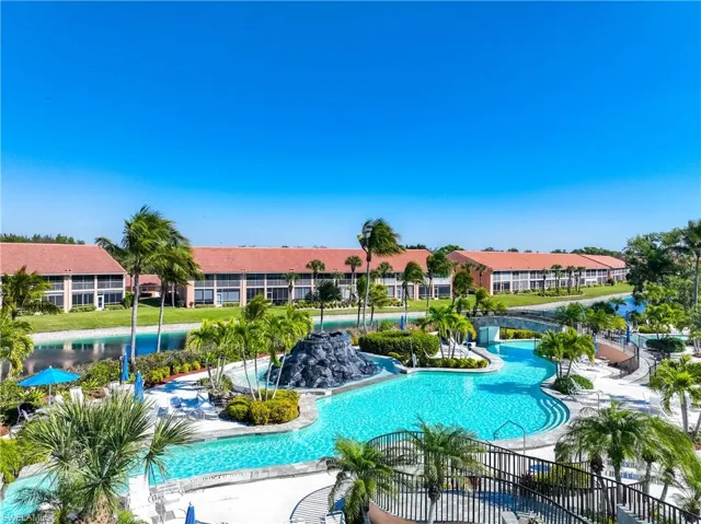 Community pool featuring a patio