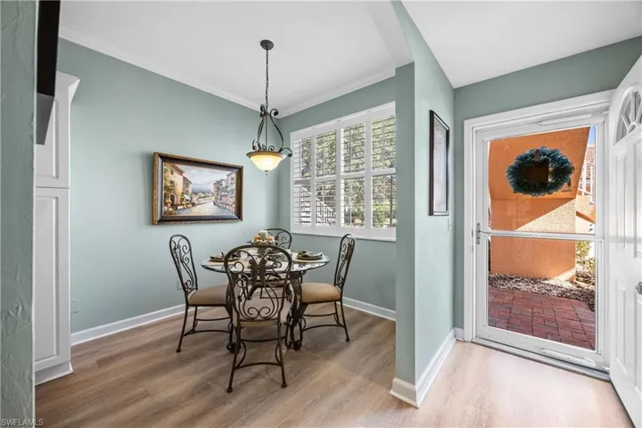 Eat in Kitchen area with natural light through plantation shutters