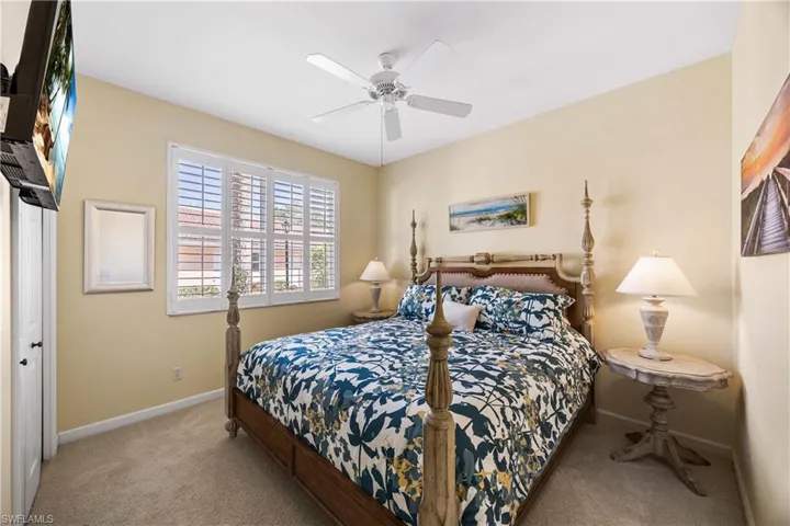 Guest Bedroom with  NEW carpet  and ceiling fan