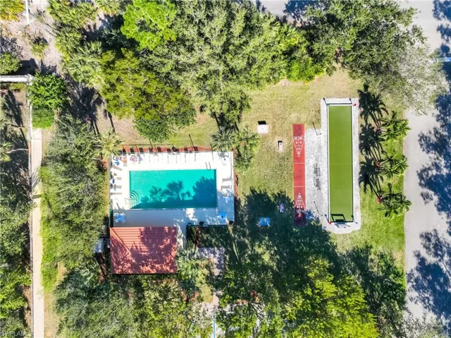Drone / aerial view of a pool area