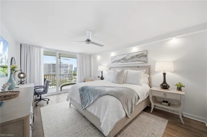 Top-floor king bedroom with upscale bedding, impact windows, and complete quiet. Renovated and move-in ready.