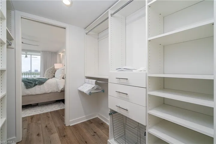 Custom closet with plenty of room for storage.