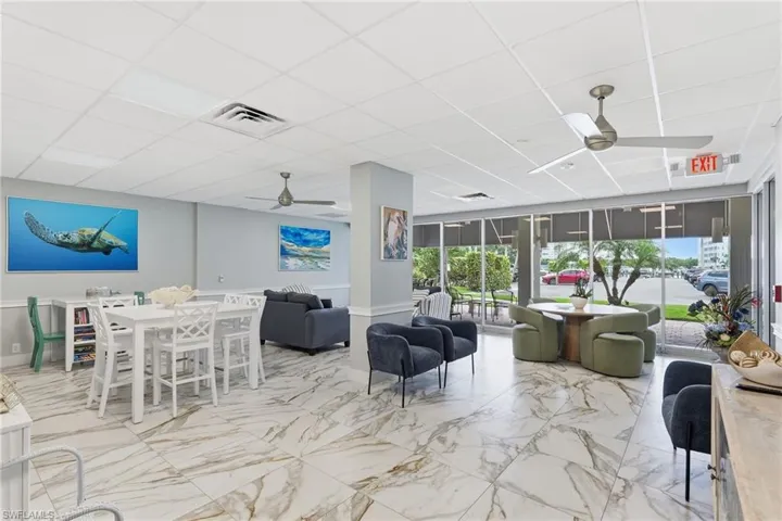 The renovated community gathering room is available for residents — well appointed and regularly used.