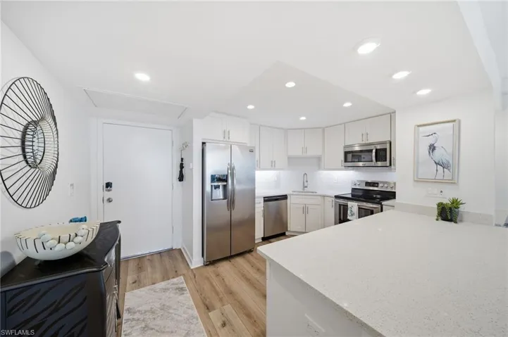 Updated kitchen with quality appliances and everything in place for short stays or extended living.