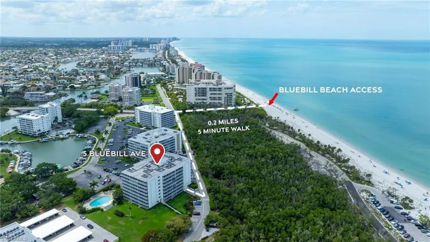 Vanderbilt Beach is a 0.2 mile walk. The sugar sand and Gulf are visible from above.