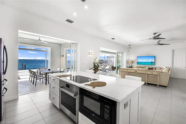 The Kitchen Island has an induction cook top, oven and microwave built in