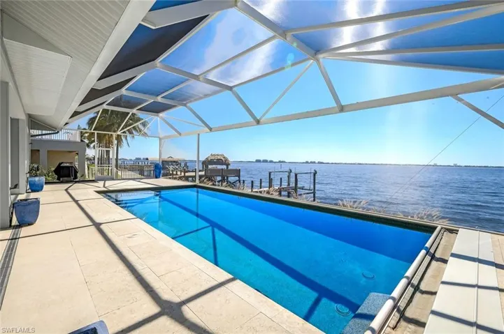 The pool is south facing and has a state of the art electronic retractable pool cover