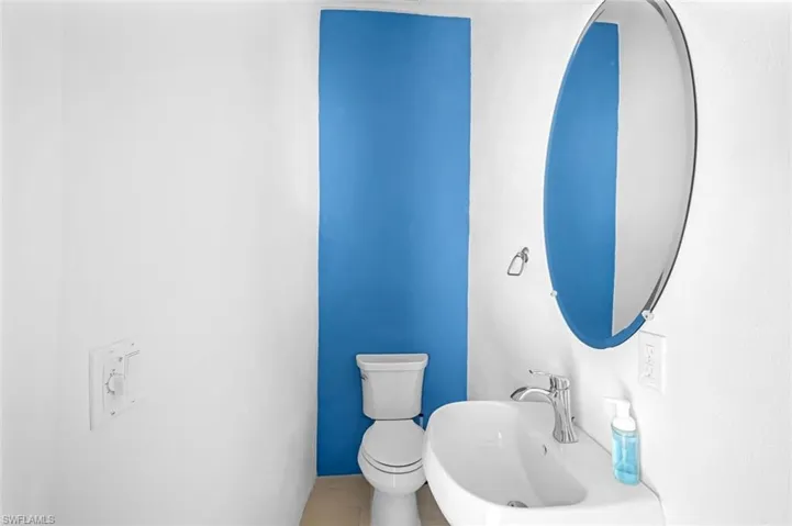 The Pool Deck features a Powder Room for added convenience